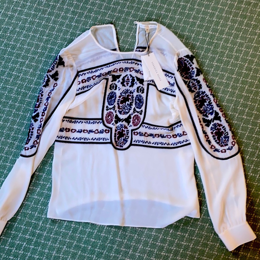 NWT Veronica beard silk blouse with embroidered sleeves, front and back.$495